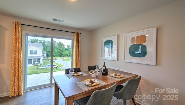 111 Eleanor Cove Rd, Arden, NC 28704 - dining room featuring wood finished floors and baseboards