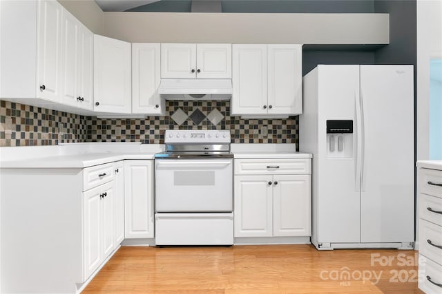 4404 Connestee Trl, Brevard, NC 28712 - kitchen with white appliances, custom exhaust hood, and light countertops