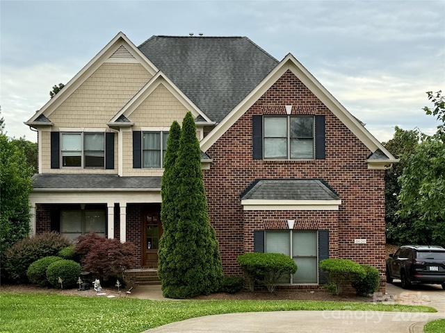 8620 Rolling Fields Rd, Charlotte, NC 28227 - view of front of home with brick siding and a shingled roof