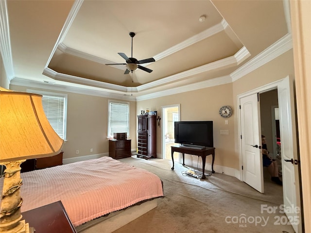 8620 Rolling Fields Rd, Charlotte, NC 28227 - carpeted bedroom featuring crown molding, a raised ceiling, baseboards, and ceiling fan