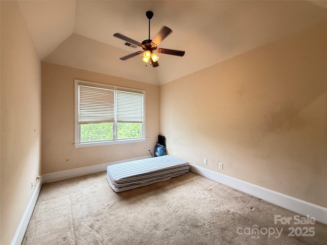 8620 Rolling Fields Rd, Charlotte, NC 28227 - unfurnished bedroom with carpet floors, vaulted ceiling, baseboards, and a ceiling fan