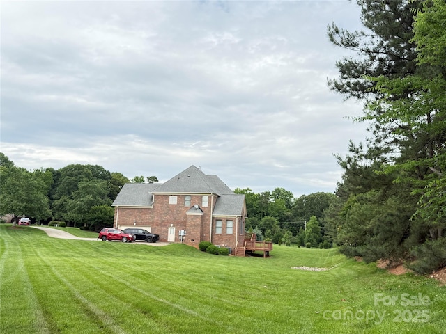 8620 Rolling Fields Rd, Charlotte, NC 28227 - view of side of home featuring brick siding and a lawn