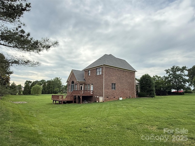 8620 Rolling Fields Rd, Charlotte, NC 28227 - back of property with brick siding, a yard, a deck, and roof with shingles