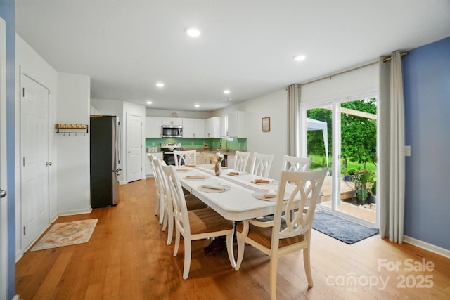 124 Vintage Woods Ct, Shelby, NC 28150 - dining area featuring light wood finished floors and recessed lighting