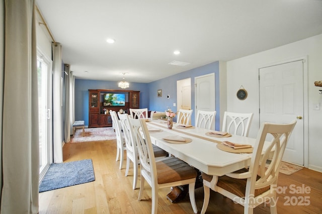 124 Vintage Woods Ct, Shelby, NC 28150 - dining area featuring light wood finished floors, a chandelier, and recessed lighting