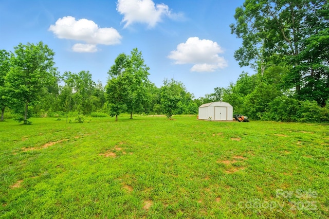 124 Vintage Woods Ct, Shelby, NC 28150 - view of green lawn with a storage shed