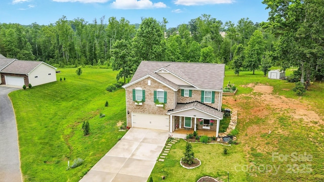 124 Vintage Woods Ct, Shelby, NC 28150 - view of front of house featuring brick siding, driveway, a porch, a front lawn, and a garage