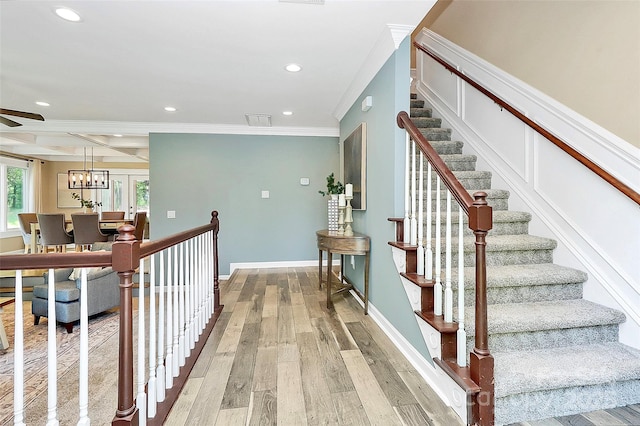1011 Bydeford Ct, Matthews, NC 28105 - stairs with crown molding, recessed lighting, wood finished floors, baseboards, and ceiling fan