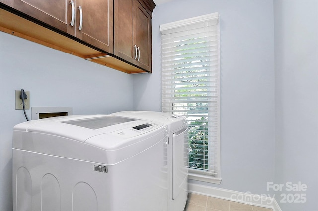 1011 Bydeford Ct, Matthews, NC 28105 - washroom featuring cabinet space, washing machine and clothes dryer, light tile patterned floors, and baseboards