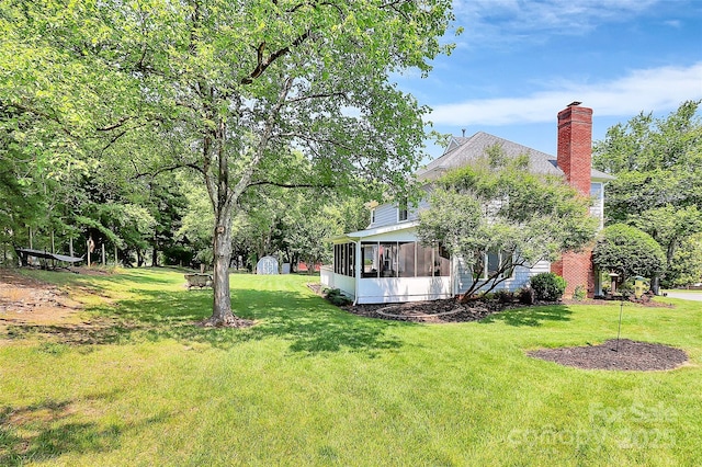 1011 Bydeford Ct, Matthews, NC 28105 - view of green lawn with a sunroom