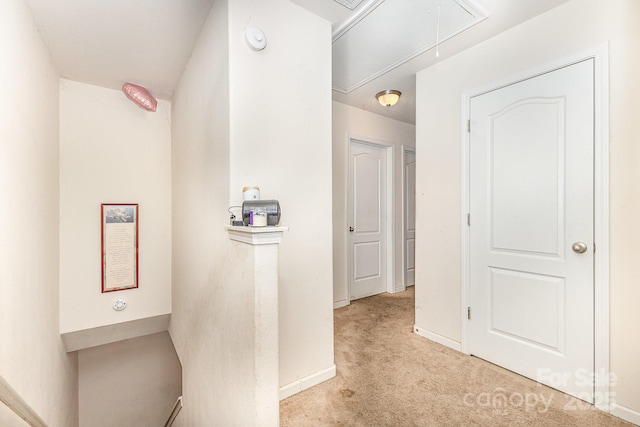 8005 Stevie Oaks Ln, Charlotte, NC 28215 - hall with attic access and carpet flooring