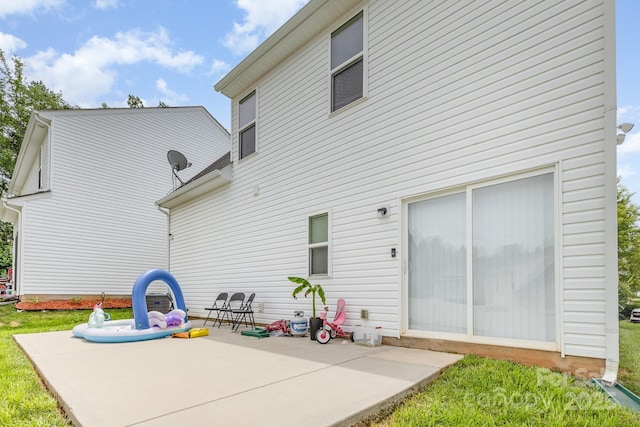 8005 Stevie Oaks Ln, Charlotte, NC 28215 - back of house featuring a patio area and a yard