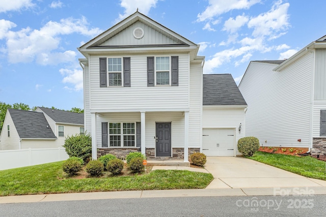 8005 Stevie Oaks Ln, Charlotte, NC 28215 - view of front of property with driveway, an attached garage, board and batten siding, covered porch, and stone siding