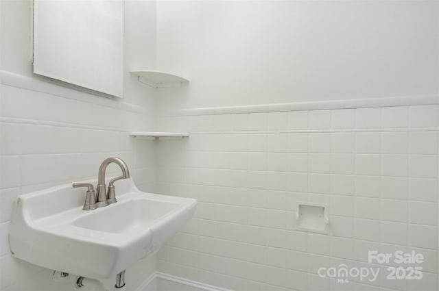 3939 Sheffield Dr, Charlotte, NC 28205 - bathroom featuring a sink and tile walls