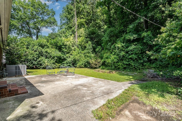 3939 Sheffield Dr, Charlotte, NC 28205 - view of patio featuring a forest view