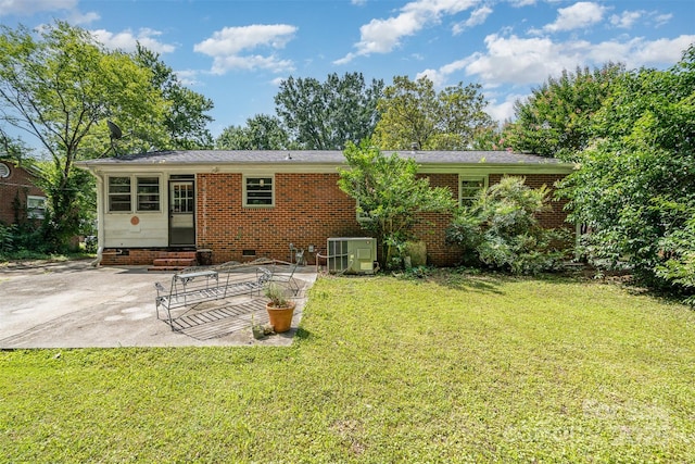 3939 Sheffield Dr, Charlotte, NC 28205 - back of property featuring entry steps, a patio, a lawn, and crawl space