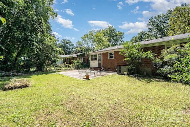 3939 Sheffield Dr, Charlotte, NC 28205 - view of grassy yard featuring a patio and entry steps
