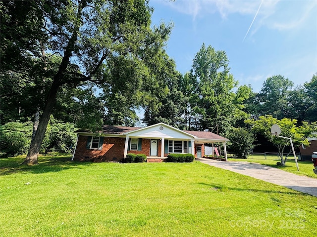 316 Meadowood Cir, Kannapolis, NC 28081 - single story home with driveway, a front lawn, an attached carport, and brick siding