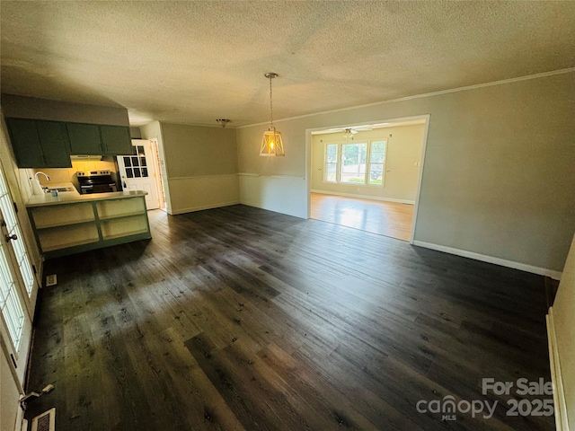 316 Meadowood Cir, Kannapolis, NC 28081 - unfurnished dining area with a textured ceiling, dark wood-style floors, ornamental molding, a sink, and ceiling fan
