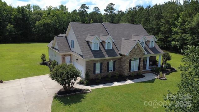 2018 Whiskery Ct, York, SC 29745 - view of front of property featuring driveway, a front lawn, stone siding, and a garage