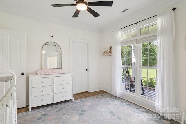 2018 Whiskery Ct, York, SC 29745 - unfurnished bedroom featuring ornamental molding, light wood-style floors, and a ceiling fan