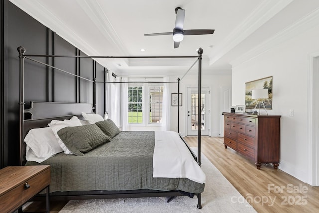 2018 Whiskery Ct, York, SC 29745 - bedroom featuring ornamental molding, light wood-type flooring, and a tray ceiling