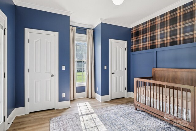 2018 Whiskery Ct, York, SC 29745 - unfurnished bedroom with wood finished floors and crown molding