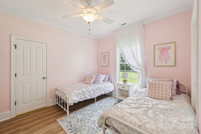 2018 Whiskery Ct, York, SC 29745 - bedroom featuring wood finished floors, ornamental molding, and ceiling fan