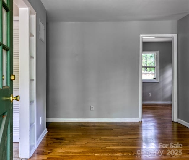 24 19th St NW, Hickory, NC 28601 - spare room with wood finished floors