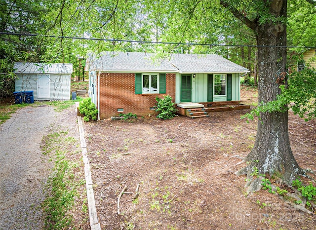 24 19th St NW, Hickory, NC 28601 - ranch-style house featuring a shed, roof with shingles, brick siding, and crawl space