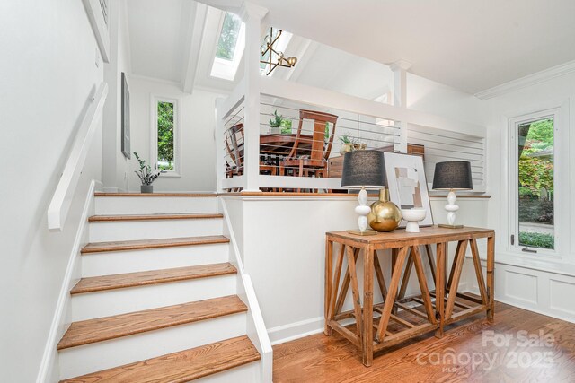 1601 Wandering Way Dr, Charlotte, NC 28226 - stairway featuring wood finished floors, ornamental molding, and healthy amount of natural light