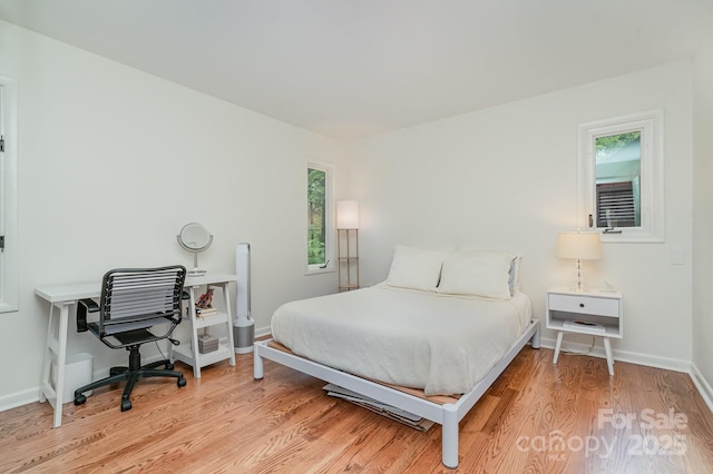 1601 Wandering Way Dr, Charlotte, NC 28226 - bedroom with light wood-style flooring and a desk
