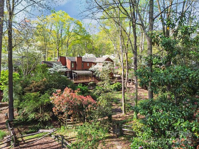 1601 Wandering Way Dr, Charlotte, NC 28226 - view of yard featuring a forest view