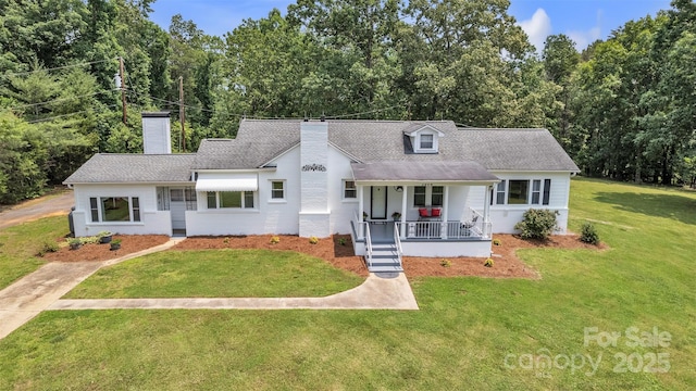 3804 Lippard Ln, Valdese, NC 28690 - cape cod home featuring covered porch, a chimney, a front yard, and roof with shingles