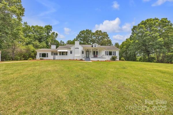 3804 Lippard Ln, Valdese, NC 28690 - back of house featuring a yard