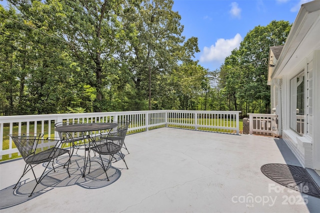 3804 Lippard Ln, Valdese, NC 28690 - view of patio / terrace featuring view of wooded area and outdoor dining space