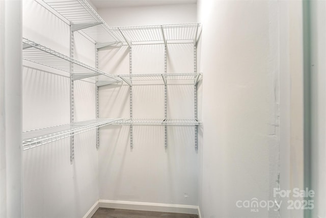 112 Lineberger St, Stanley, NC 28164 - walk in closet with wood finished floors