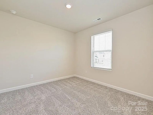 213 Jp Dr, Albemarle, NC 28001 - spare room featuring baseboards, carpet, a smoke detector, and recessed lighting