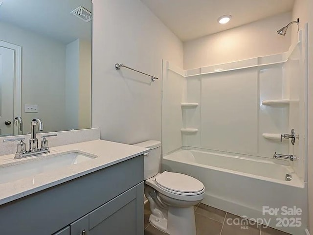 213 Jp Dr, Albemarle, NC 28001 - full bathroom featuring vanity, toilet,  shower combination, and tile patterned flooring
