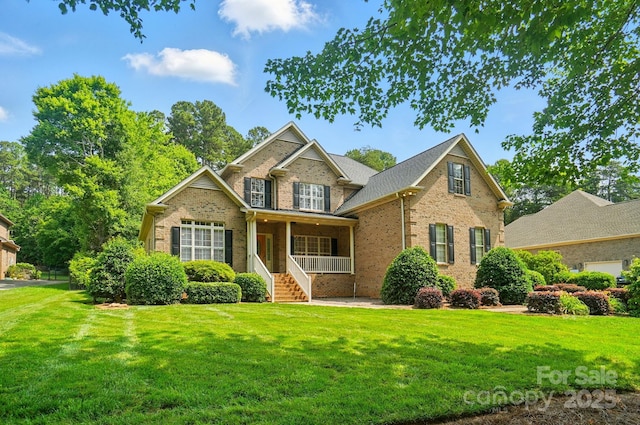 3735 Gordon St, Terrell, NC 28682 - traditional-style home featuring brick siding, covered porch, and a front lawn