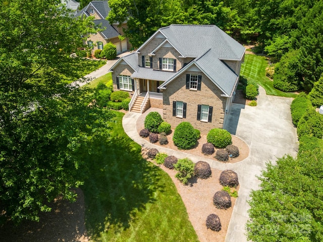 3735 Gordon St, Terrell, NC 28682 - view of front of house with covered porch, stairway, concrete driveway, and a front yard