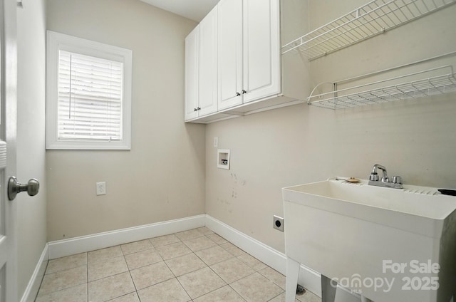 3735 Gordon St, Terrell, NC 28682 - laundry room with cabinet space, baseboards, washer hookup, and light tile patterned floors