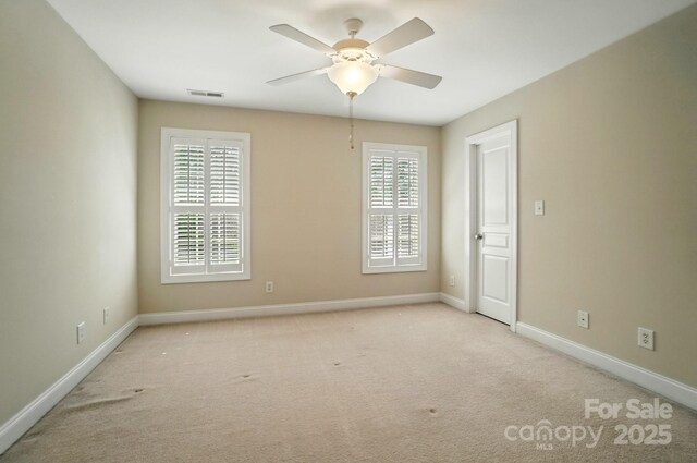 3735 Gordon St, Terrell, NC 28682 - carpeted empty room featuring healthy amount of natural light, ceiling fan, and baseboards