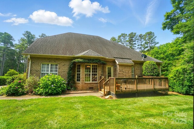 3735 Gordon St, Terrell, NC 28682 - rear view of property with brick siding, a deck, a lawn, and a shingled roof