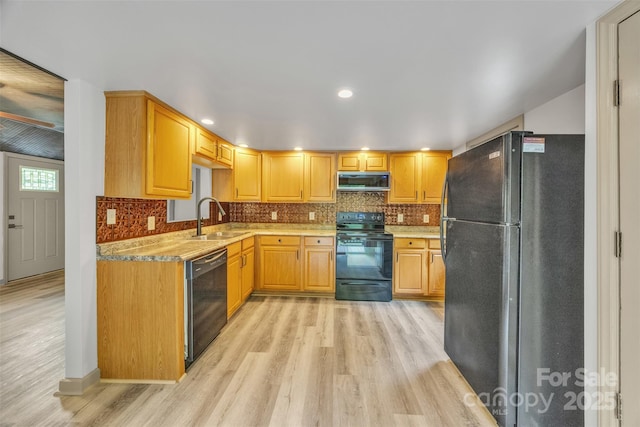 1598 Claybank Rd, West Jefferson, NC 28694 - kitchen with black appliances, a sink, light wood-style floors, tasteful backsplash, and recessed lighting