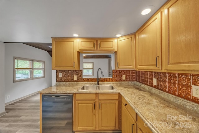 1598 Claybank Rd, West Jefferson, NC 28694 - kitchen with black dishwasher, a sink, decorative backsplash, baseboards, and light wood-style flooring