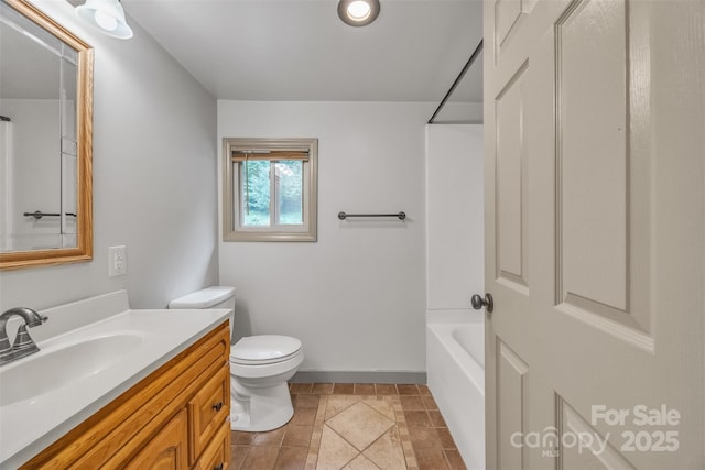 1598 Claybank Rd, West Jefferson, NC 28694 - full bathroom with vanity, toilet, baseboards, and shower / washtub combination