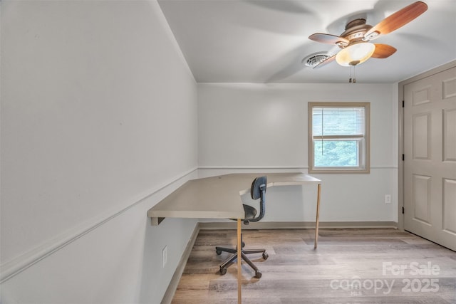 1598 Claybank Rd, West Jefferson, NC 28694 - unfurnished office with wood finished floors, ceiling fan, baseboards, and built in desk