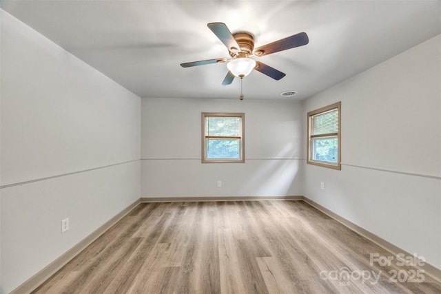 1598 Claybank Rd, West Jefferson, NC 28694 - empty room with light wood-style floors, baseboards, and ceiling fan