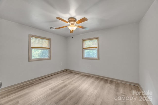 1598 Claybank Rd, West Jefferson, NC 28694 - spare room with light wood-style floors, a ceiling fan, and baseboards